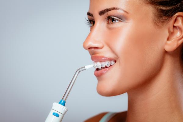 How to clean between teeth